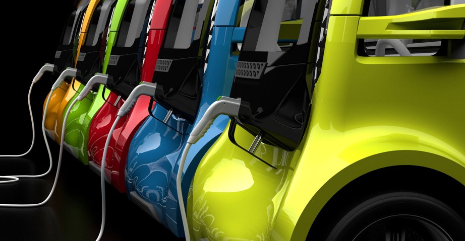 five electric cars being charged