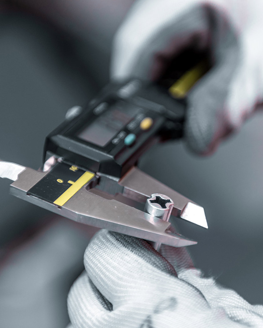 a person holding a measuring device