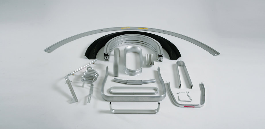 Studio photo showcasing the malleability of extruded aluminium profiles